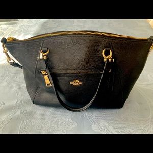 Genuine Coach leather bag. Black with gold accents.